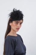Casquete plumas negro