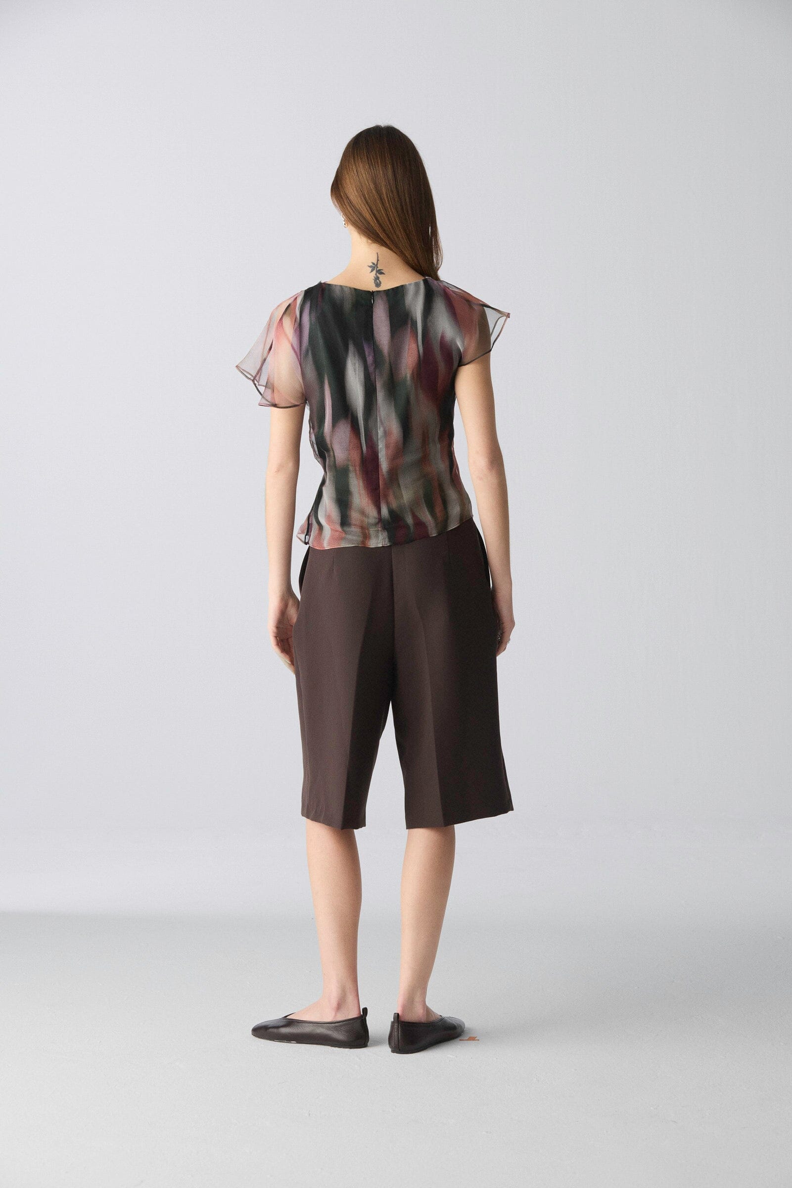 Top drapeado de organza estampado